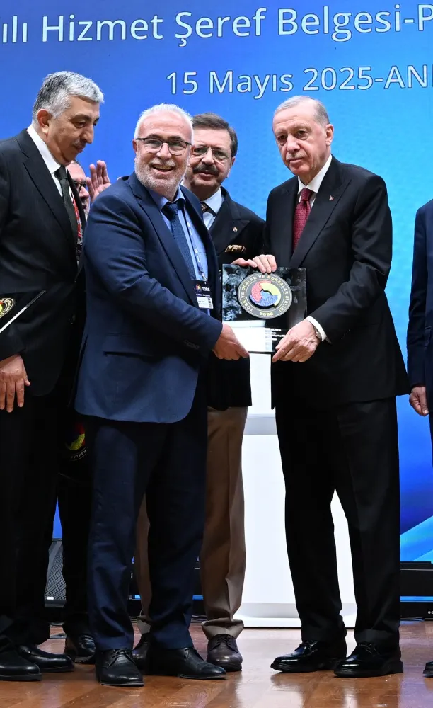 iş insanı ACARA şeref ve hizmet belgesi verildi